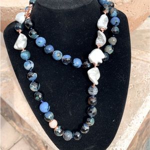 32” Lapis Baroque necklace with rose gold colored findings. Single knotted